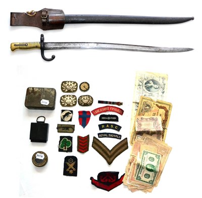 Lot 156 - A Collection of Militaria and Related Memorabilia, comprising: an 1867 pattern French sabre bayonet