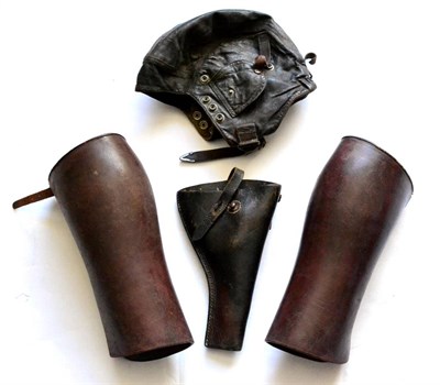 Lot 164 - A Vintage Leather Flying Helmet, a Leather Pistol Holster and a Pair of Leather Gaiters (4)