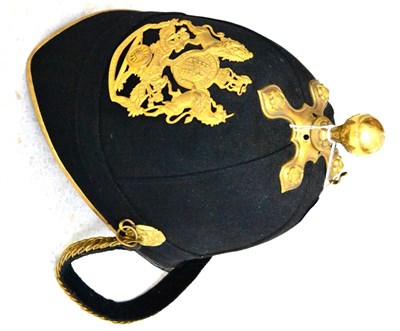 Lot 189 - Royal Artillery, An 1878 Pattern Blue Cloth Covered Helmet, complete with gilt brass fittings...