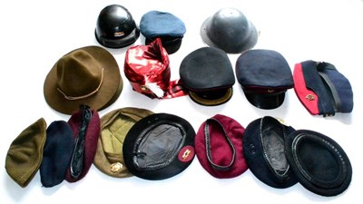 Lot 199 - A Collection of Military and Other Head Dress, including two Royal Army Medical Corps peaked...