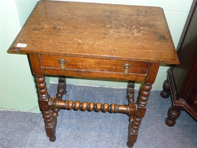 Lot 475 - A 17th Century Joined Oak Side Table, the moulded top above a single frieze drawer, raised on block