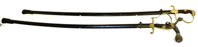 Lot 222 - A German Third Reich Officer's Dress Sword, the slightly curved, slender single edge blade with...