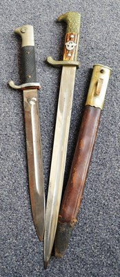 Lot 228 - A German Third Reich Police Dress Dagger, the 33cm steel blade by E & F Horster, Solingen, the...