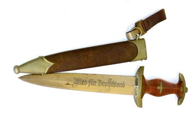 Lot 229 - A German Third Reich Model 1933 SA Dagger, the double edge blade etched, ";Alles fur Deutschland"