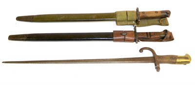 Lot 247 - A British 1907 Pattern Bayonet, by Sanderson, with scabbard; a US  M1917 Pattern Bayonet, by...