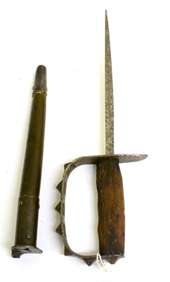 Lot 263 - A US First World War Trench Knife, with triangular section blade, length 22.5cm, the steel hilt...