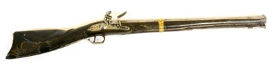 Lot 369 - A 19th Century Indian Flintlock Blunderbuss, the brass-banded steel barrel, length 55.7cm, engraved