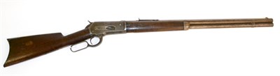 Lot 373 - A Winchester Model 1886 40-82 Lever Action Rifle, the 64cm octagonal steel barrel stamped,...