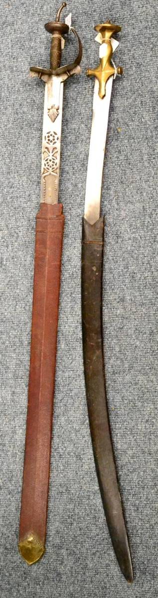 Lot 275 - A 19th Century Indian Khanda, with 76cm double edge steel blade widening at the tip and with a...