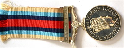 Lot 35 - An Operational Service Medal 2000, with Afghanistan clasp, to 25215450 GNR. C.A. CLARK RA, in...