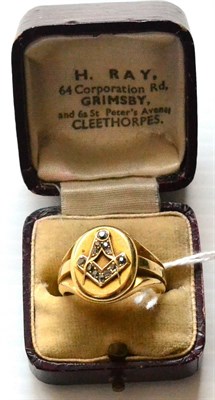 Lot 93 - An 18ct Gold Masonic Signet Ring, ornamented with a square and compass set with rose diamonds (12.8