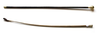 Lot 131 - A Riding Whip/Swagger Stick, with braided linen haft, the nickel pommel embossed with the badge...