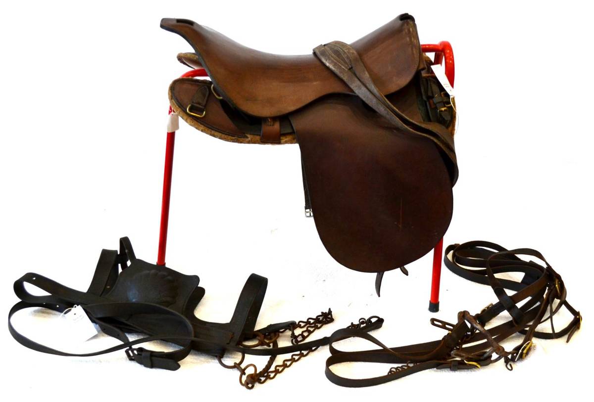 Lot 136 - A First World War Cavalry Trooper's Universal Pattern Leather Saddle, with steel hinged arches,...