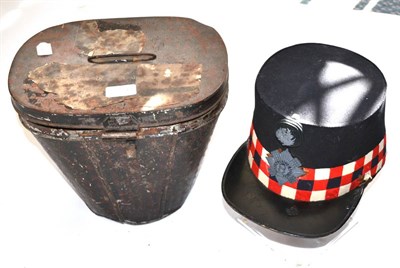 Lot 157 - A Dark Blue Cloth Shako to the Royal Scots Regiment, with crimson, black and white chequered...