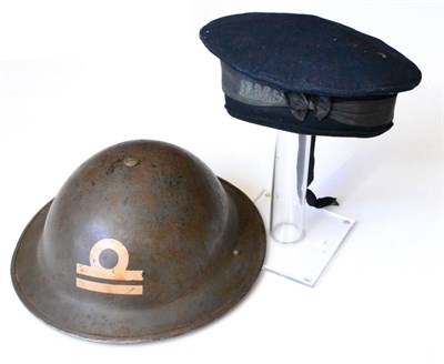 Lot 164 - A Second World War Royal Navy Ratings Cap, in blue wool, with cap tally printed HMS in gilt; a...