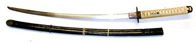 Lot 203 - A Japanese Shin Gunto Katana, the tempered blade with undulating hamon, length 65.5 cm, with single