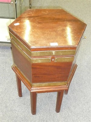 Lot 514 - A George III Mahogany and Brass Bound Wine Cooler and Associated Stand, the hexagonal body...