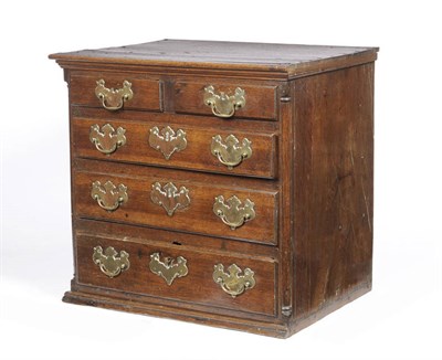 Lot 516 - An 18th Century Oak Straight Front Chest of Small Proportions, the moulded top above two short...