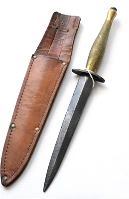 Lot 243 - A Fairburn-Sykes Fighting Knife by Wilkinson Sword, the 16.5cm double edge steel blade bearing...