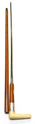 Lot 284 - A Malacca Swordstick, the 60.5cm narrow fullered steel blade stamped WILKINSON SWORD CO., Mk.I,...