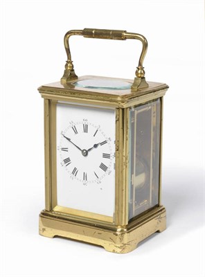 Lot 522 - A Gilt Brass Striking Carriage Clock, circa 1890, the corniche case with carrying handle,...