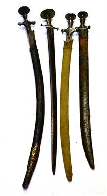 Lot 300 - Four Various Indian Tulwars, three with Delhishahi-type hilts, the other with Sindhi-type hilt, all