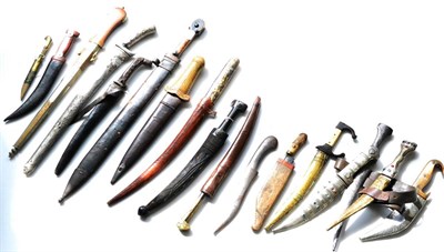 Lot 307 - A Collection of Seventeen Various Ethnic Knives and Daggers, including janbiyas, kindjals, khanjars