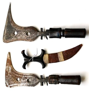 Lot 315 - Two Mangbetu (Congo) Trumbash Knives, of sickle form, each with a wood handle, one bound with...