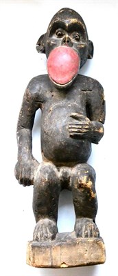 Lot 344 - An Early 20th Century Central African Monkey Figure, possibly Hemba, with deep sunken eyes,...