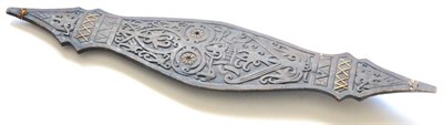 Lot 352 - A Native Wood Dance Shield, of elongated undulating lozenge form, carved with foliate strapwork and