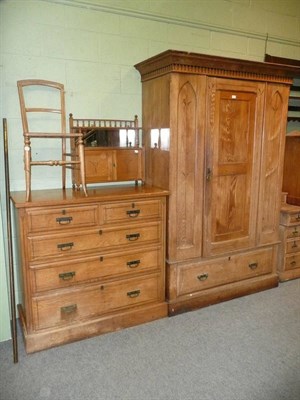 Lot 531 - A Victorian Ash and Ebonised Wardrobe, late 19th century, the cavetto moulded cornice above a...