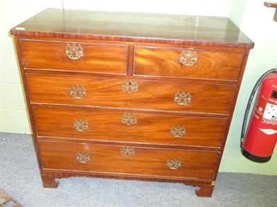 Lot 532 - A Late George III Mahogany Straight Front Chest of Drawers, early 19th century, with two short over