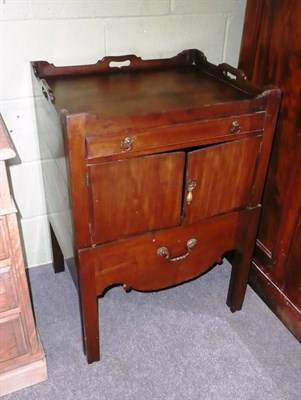 Lot 534 - A George III Mahogany Bedside Commode, late 18th century, the tray top above a single frieze drawer