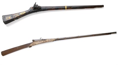 Lot 459 - A 19th Century Albanian Miquilet Musket, with 68.5cm single band steel barrel, wood full stock with