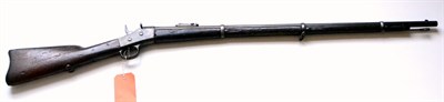 Lot 467 - A Remington Rolling Block Rifle, the 89cm steel barrel with hinged ladder rear sight, the...