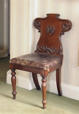 Lot 543 - A William IV Mahogany Hall Chair, mid 19th century, the leaf carved scrolling back support...