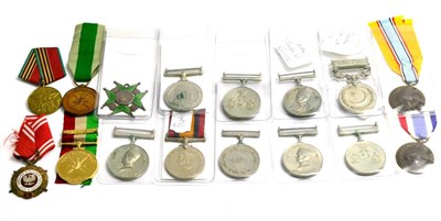 Lot 71 - Fourteen Various Foreign Medals, comprising an Omani General Service Medal, an Omani Peace Medal, a