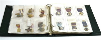 Lot 120 - A Collection of Sixteen Red Cross Society Medals, including Profiency in Red Cross Nursing,...