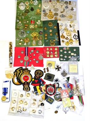 Lot 124 - A Collection of Military Cap Badges, Buttons and Medals, including a First World War Silver War...