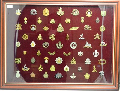 Lot 136 - A Collection of One Hundred and Eighteen Military Cap Badges and Shoulder Titles, in brass,...