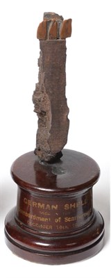 Lot 151 - Bombardment of Scarborough: First World War Shell Fragment, mounted on a turned wood pedestal...