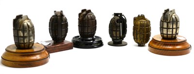 Lot 155 - A Collection of Five Deactivated Mills Bombs (Hand Grenades), one stamped TA&S, and mounted on...