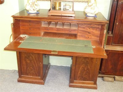 Lot 559 - A Victorian Mahogany Pedestal Desk, late 19th century, the deep secretaire drawer with fall...