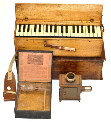 Lot 186 - A Three Octave Tent Harmonium, believed used in the First World War trenches, contained within...