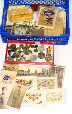 Lot 197 - Militaria, including cap badges, buttons, sweetheart brooches, a webbing belt, postcards and...