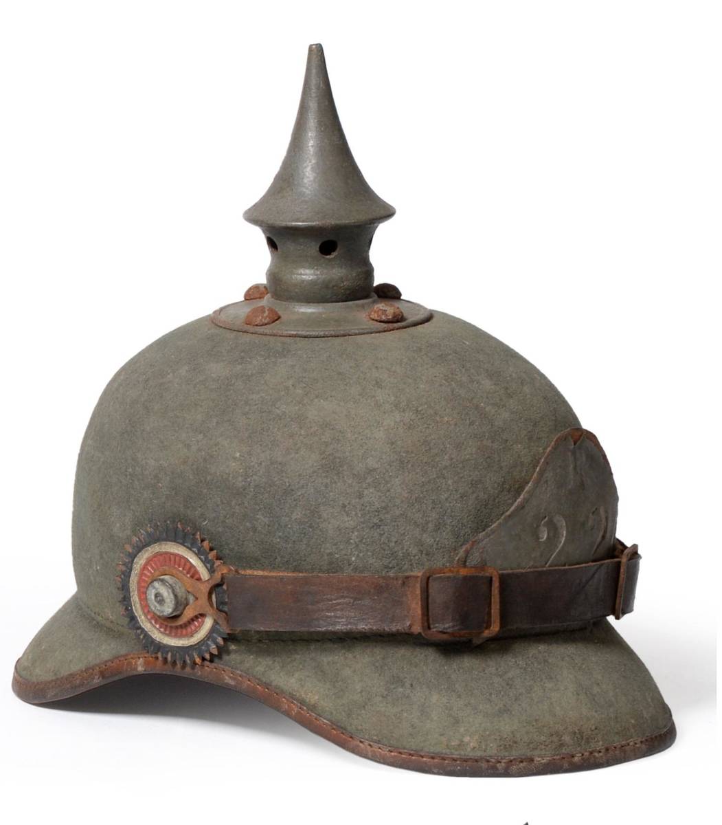 Lot 250 - An Unusual First World War 22nd R.Regiment Ersatz Felt Pickelhaube, the grey painted steel...