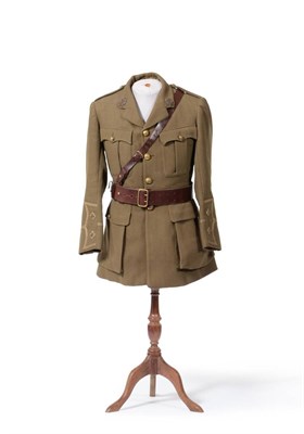 Lot 258 - A Second World War No.2 Service Tunic to a Lieutenant, Royal Army Service Corps, with brass...