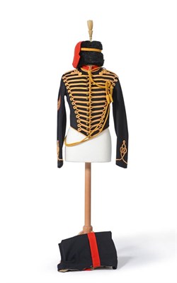 Lot 266 - A Royal Horse Artillery Full Dress Tunic, to a Sergeant, with brass ball buttons, yellow cord...