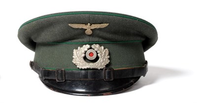 Lot 277 - A German Third Reich EM/NCO's Visor Cap, possibly Panzer division, in field grey with green piping