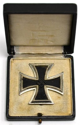 Lot 281 - A German Third Reich Iron Cross, First Class, the horizontal sword shape pin stamped L/52, in a...